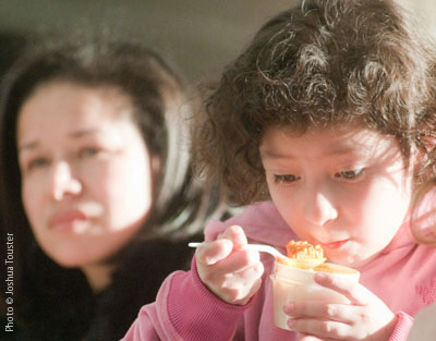 Status Report Image - Girl eating healthy food